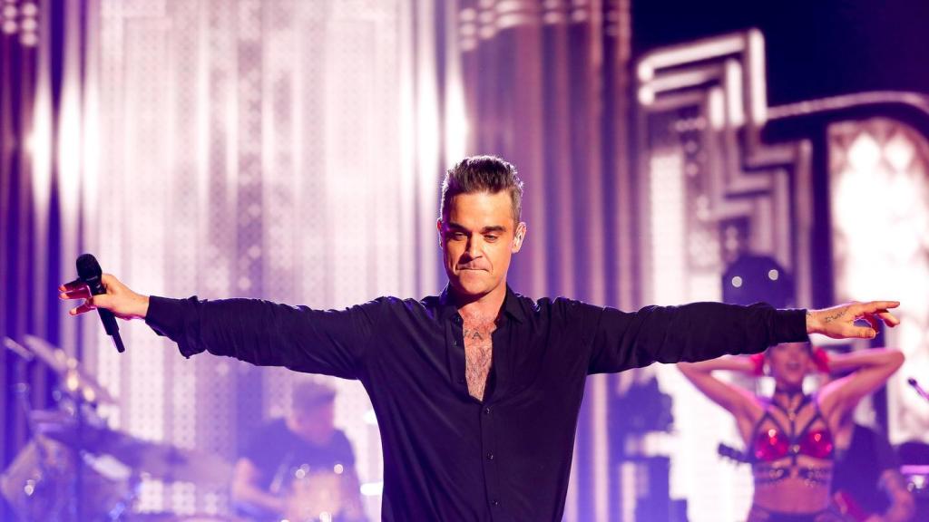 De ce nu mai scăpăm de Robbie Williams, semizeul muzicii pop