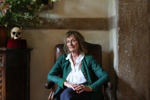 Amanda Feilding sat in a leather armchair
