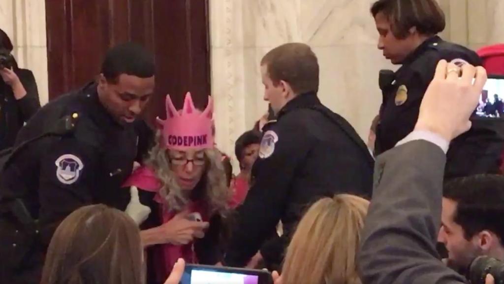 Woman Convicted After Laughing at Jeff Sessions Gets New Trial