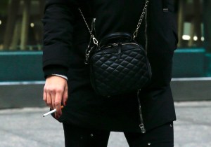 woman holding a cigarette