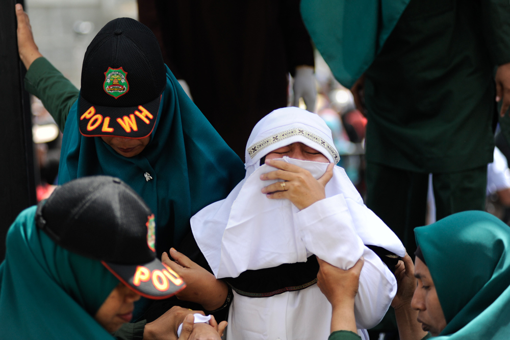There’s a Battle Brewing Over Whether or Not the Public Can View Sharia Canings In Aceh