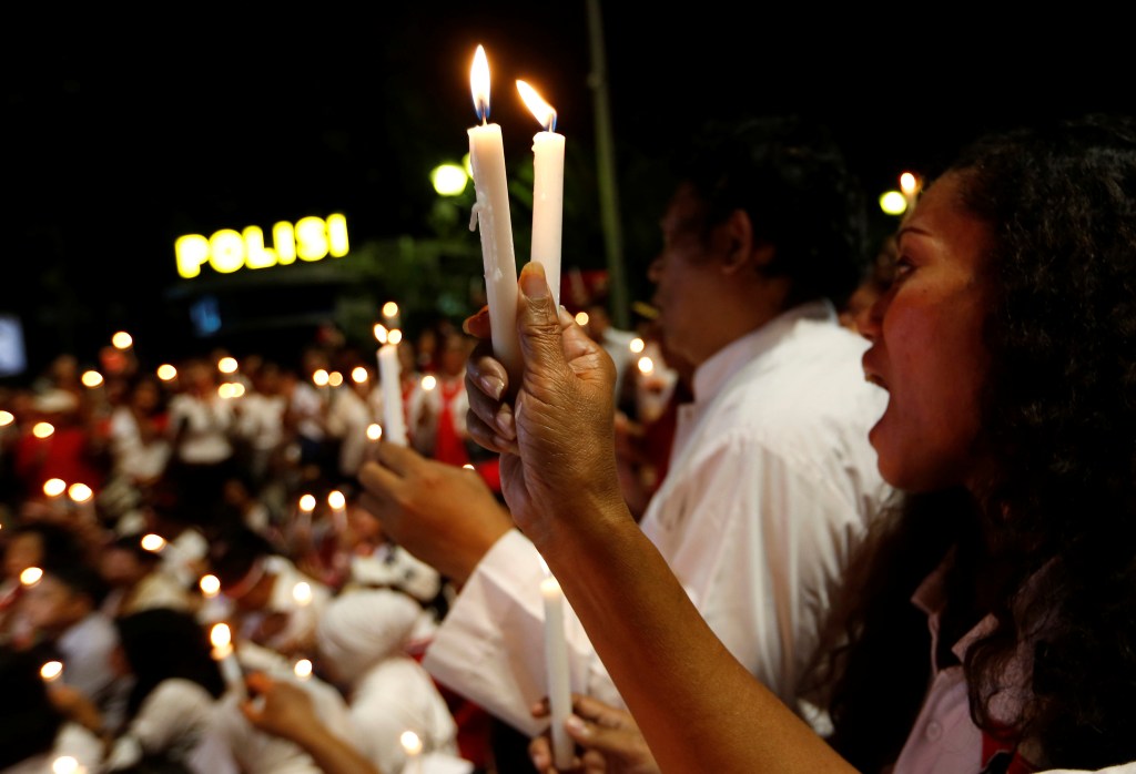 a candlelight vigil in jakarta
