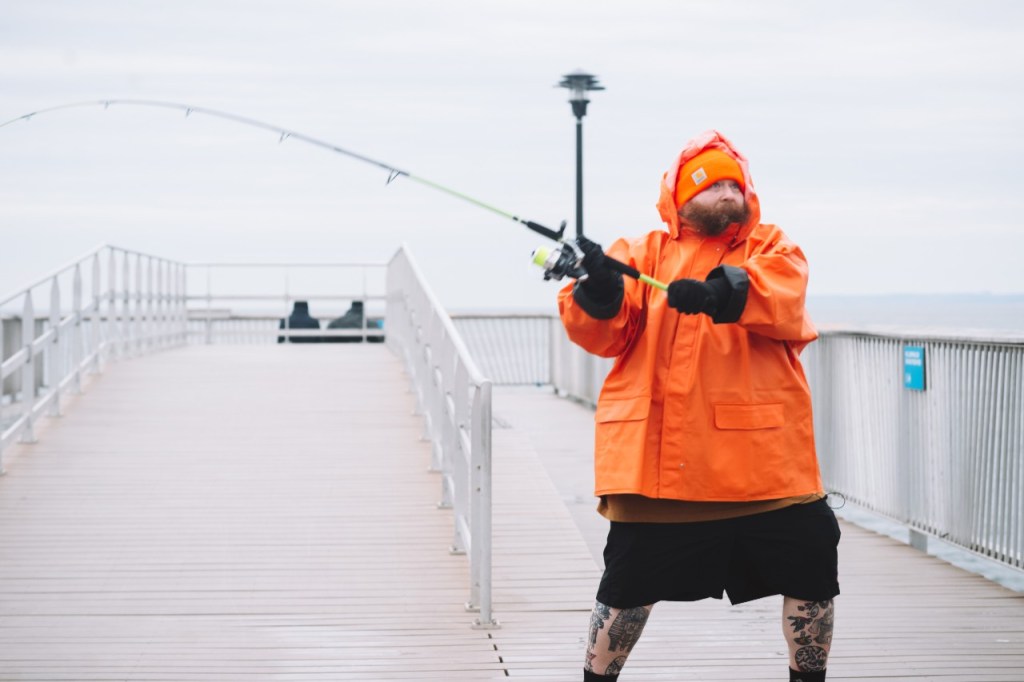 Watch Action Bronson Fish At Coney Island Using Nathan’s Hot Dogs as Bait