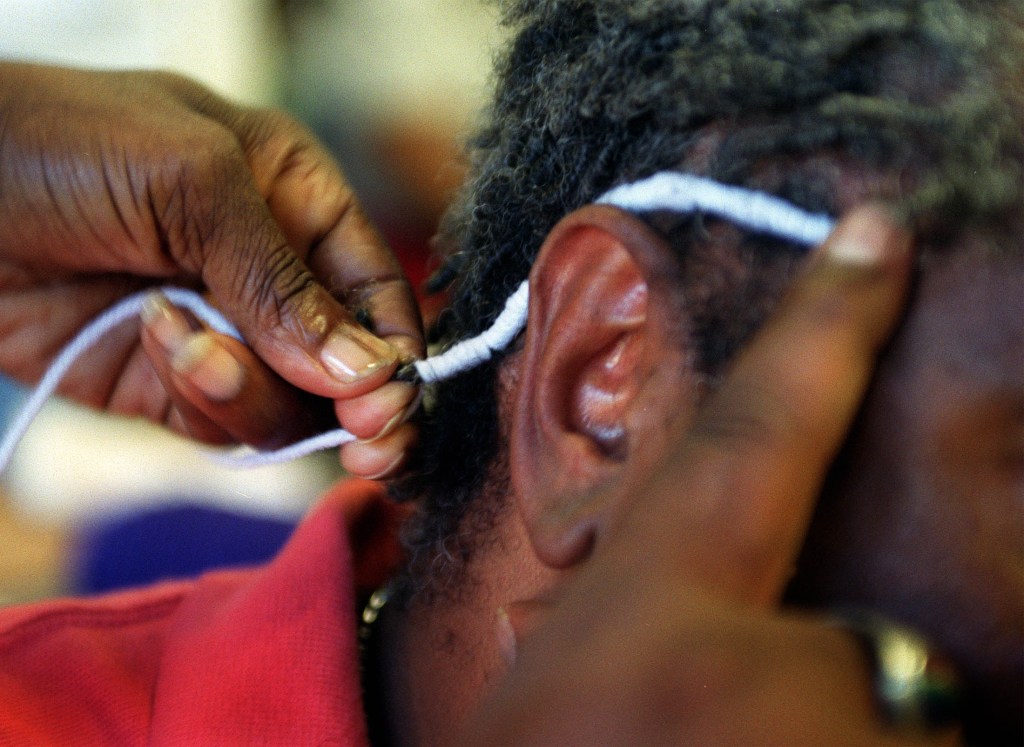 New Jersey governor throws surprise twist into hair braiding debate