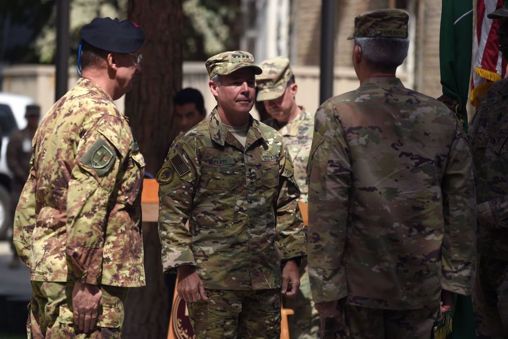 The top U.S. military commander in Afghanistan narrowly survived a Taliban attack in Kandahar Thursday — just days ahead of national parliamentary elections.