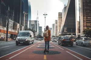 Woman walking in European city.