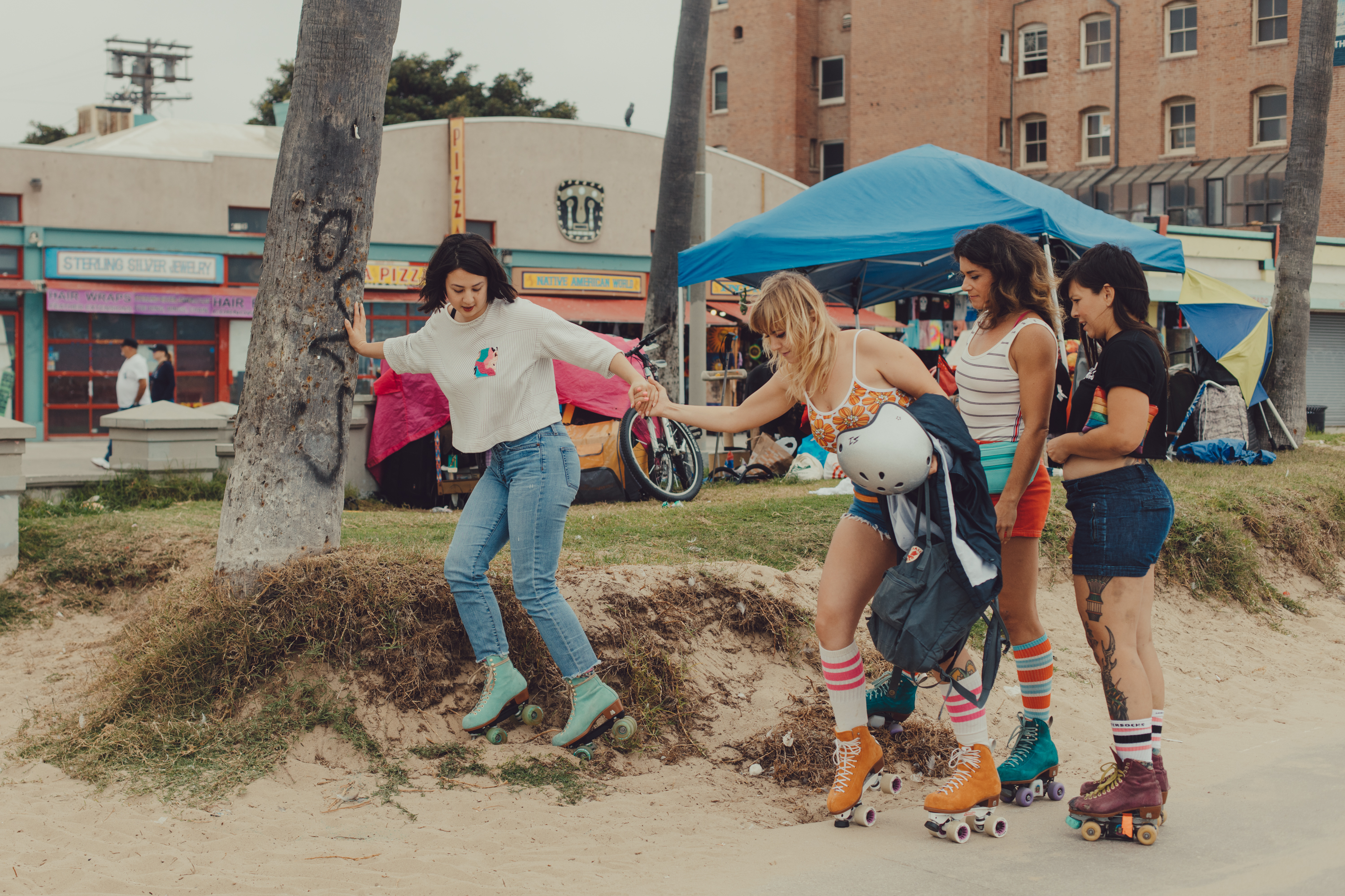 Moxi Skate girls help me down a sand hill