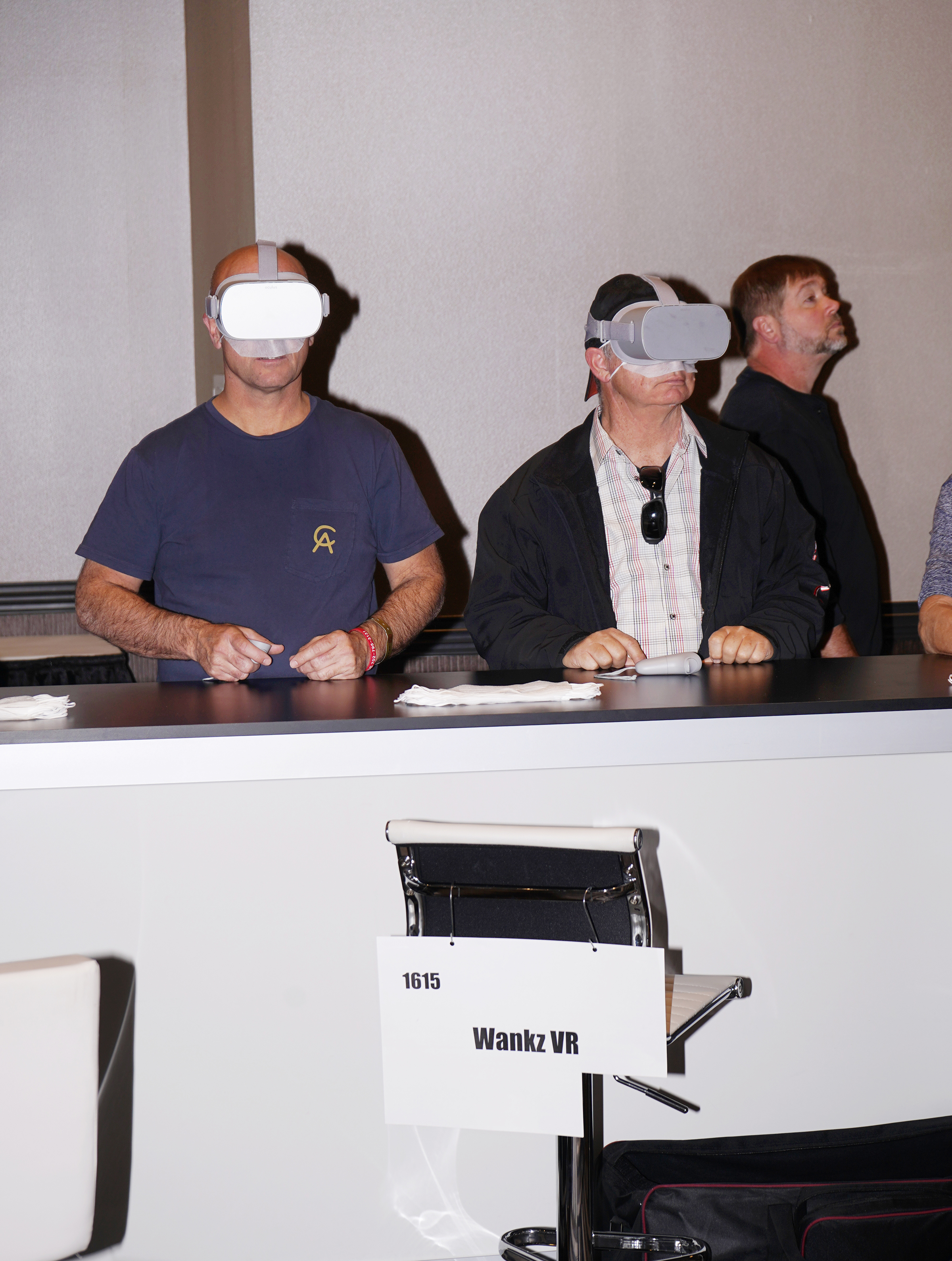 Two men in VR headsets