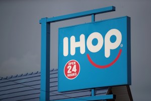 blue ihop sign that says open 24 hours