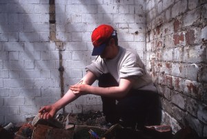 man injecting heroin