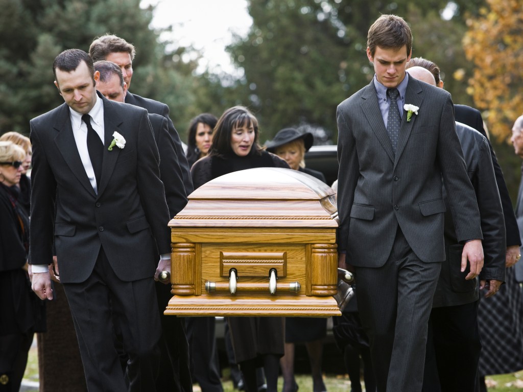 pallbearers-carrying-casket-funeral