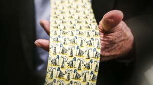 A tie covered in drawings of oil wells.