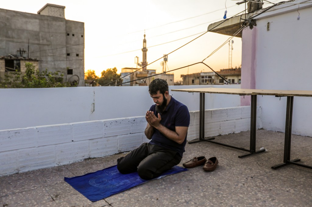 The scene was apocalyptic. Twisted steel from the skeletal frames of destroyed vehicles sticking out of mounds of earth; ammunition belts strewn along the side of the road; bloated and decomposing bodies of ISIS fighters lying between the obliterated buil