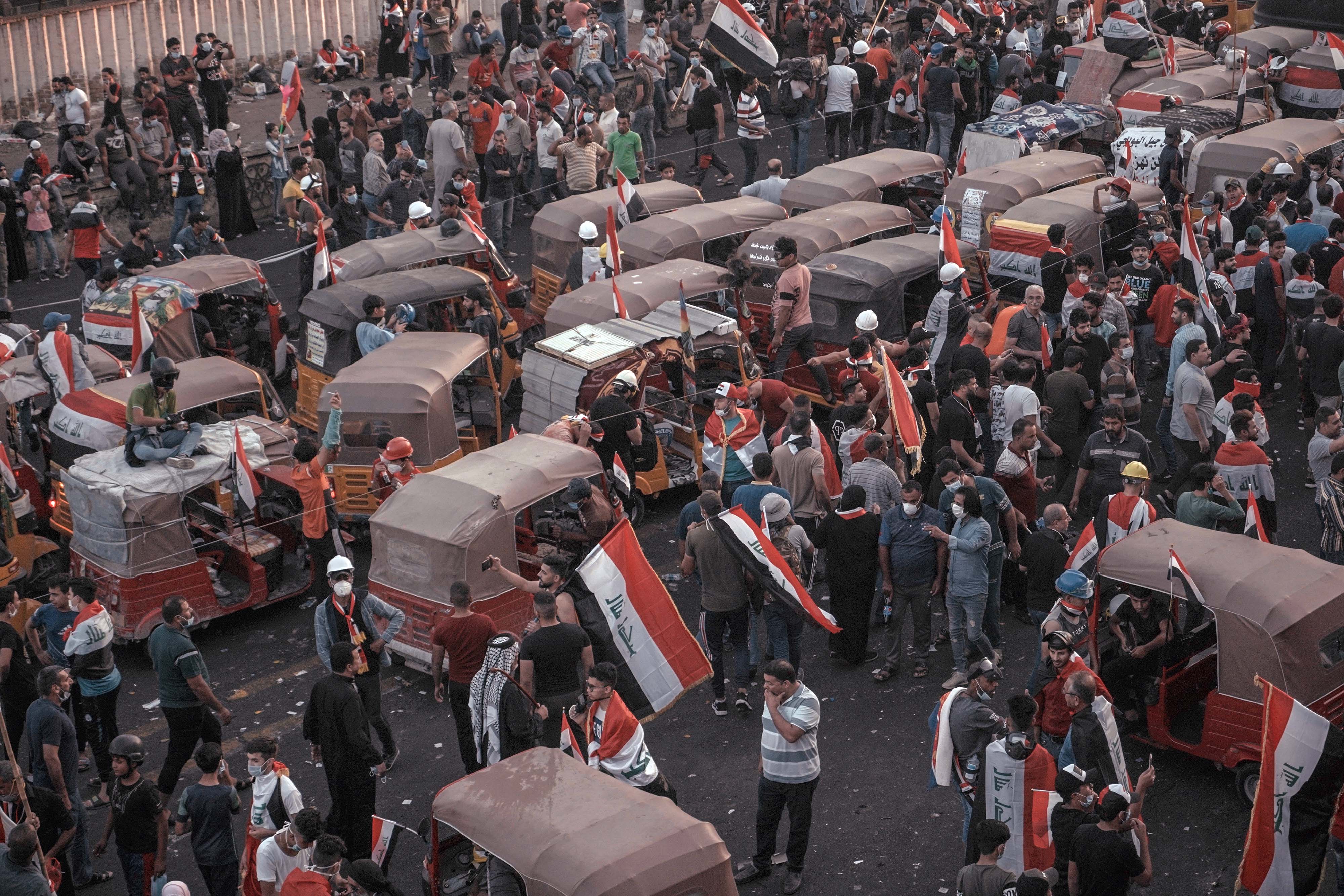 Tuk-tuks on the street during the protests in Baghdad, Iraq