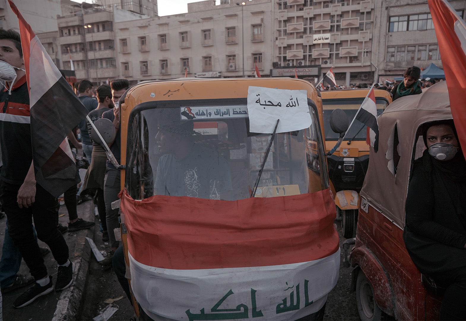 The front of a tuk-tuk on the street during the demonstrations in Baghdad, Iraq