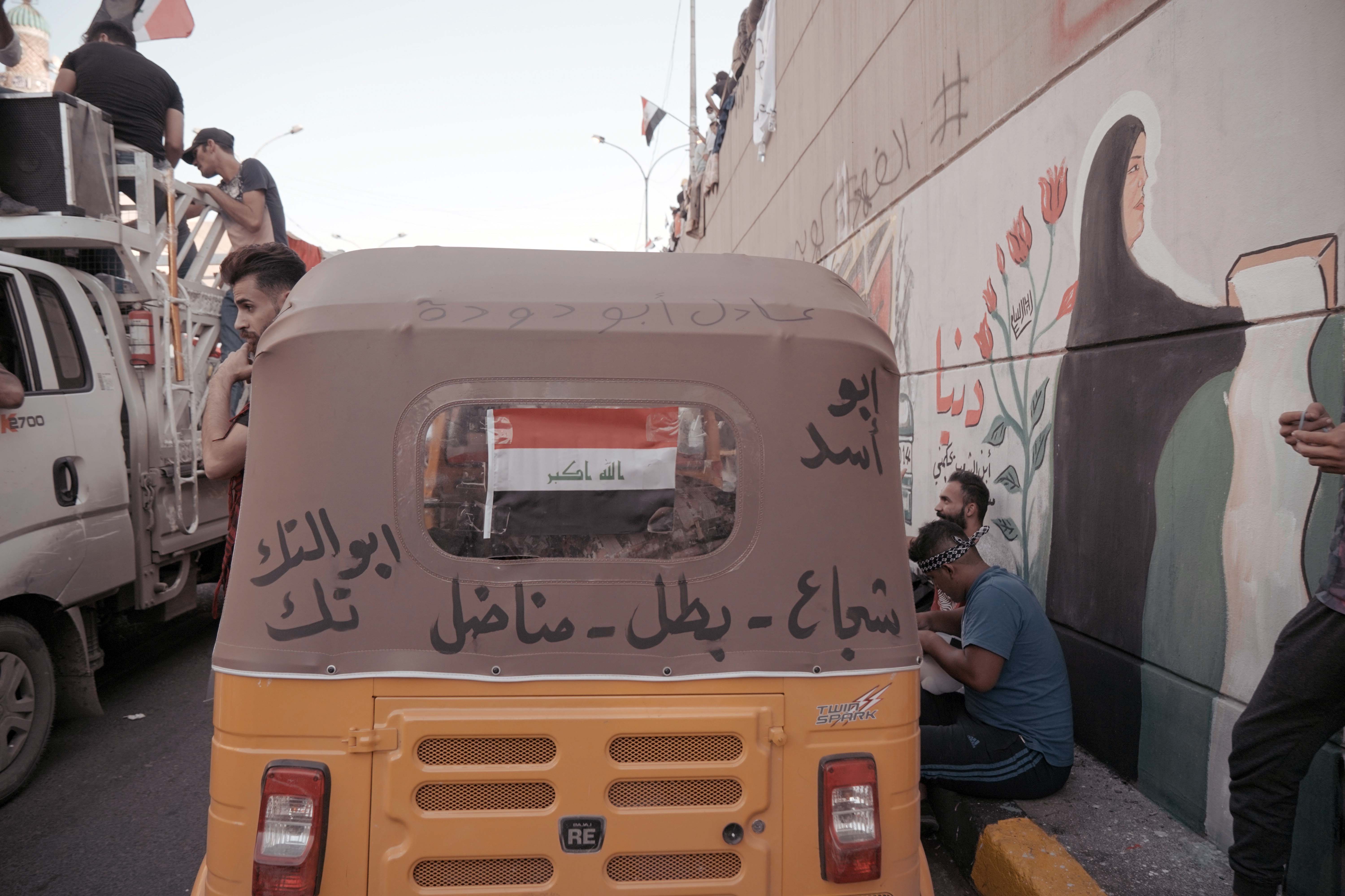 The back of a tuk-tuk on the street during the demonstrations in Baghdad, Iraq