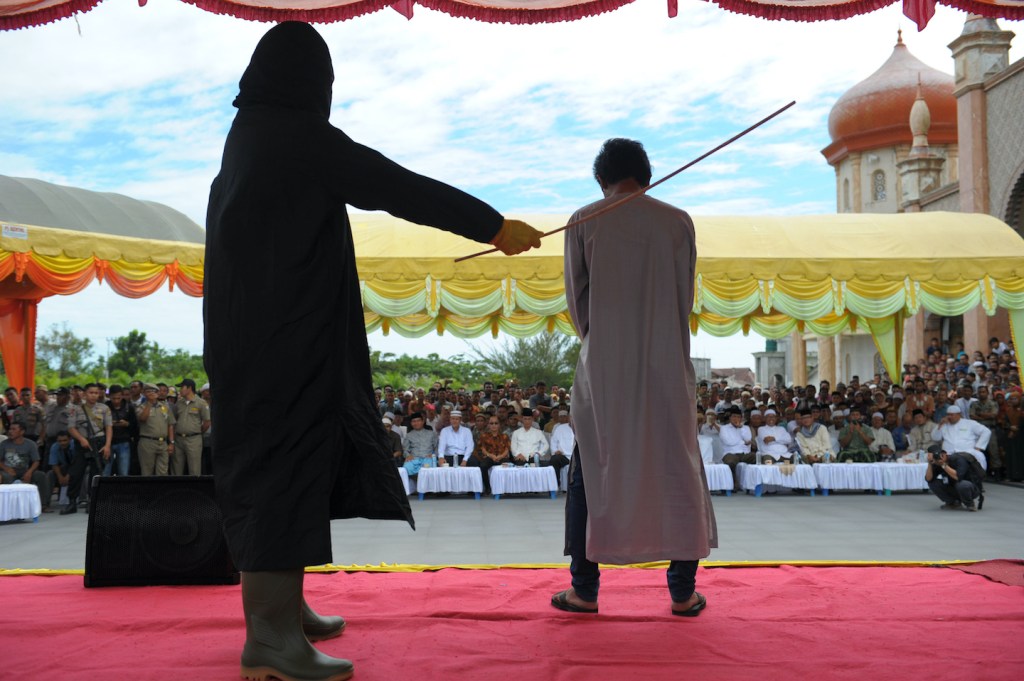 public floggging aceh indonesia
