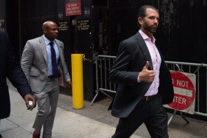 Donald Trump, Jr., son of US President Donald Trump, gives a thumbs-up as he walks outside of Trump Tower in New York, September 24, 2019.
