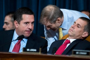 Devin Nunes, R-Calif., Rep. Jim Jordan, R-Ohio, and minority counsel Stephen Castor, confer during the House Intelligence Committee hearing on the impeachment inquiry of President Trump in Longworth Building on Wednesday, November 13, 2019.