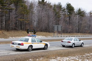police car on the side of the road