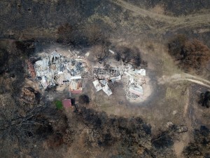 A property at Nerrigundah, Australia, Monday, Jan. 13, 2020, is destroyed after a wildfire ripped through the town on New Year's Eve.
