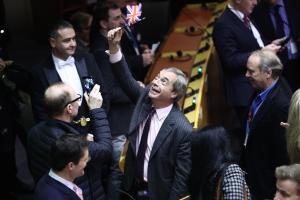 Nigel Farage waves a Union Jack