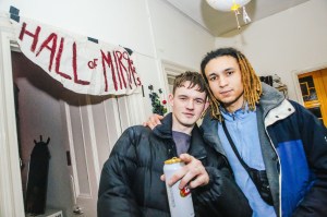 two guys at a house party