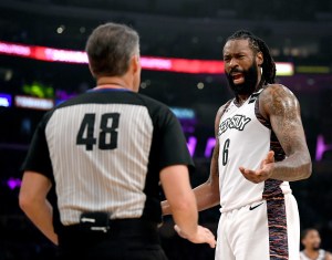 DeAndre Jordan scoffs at a referee