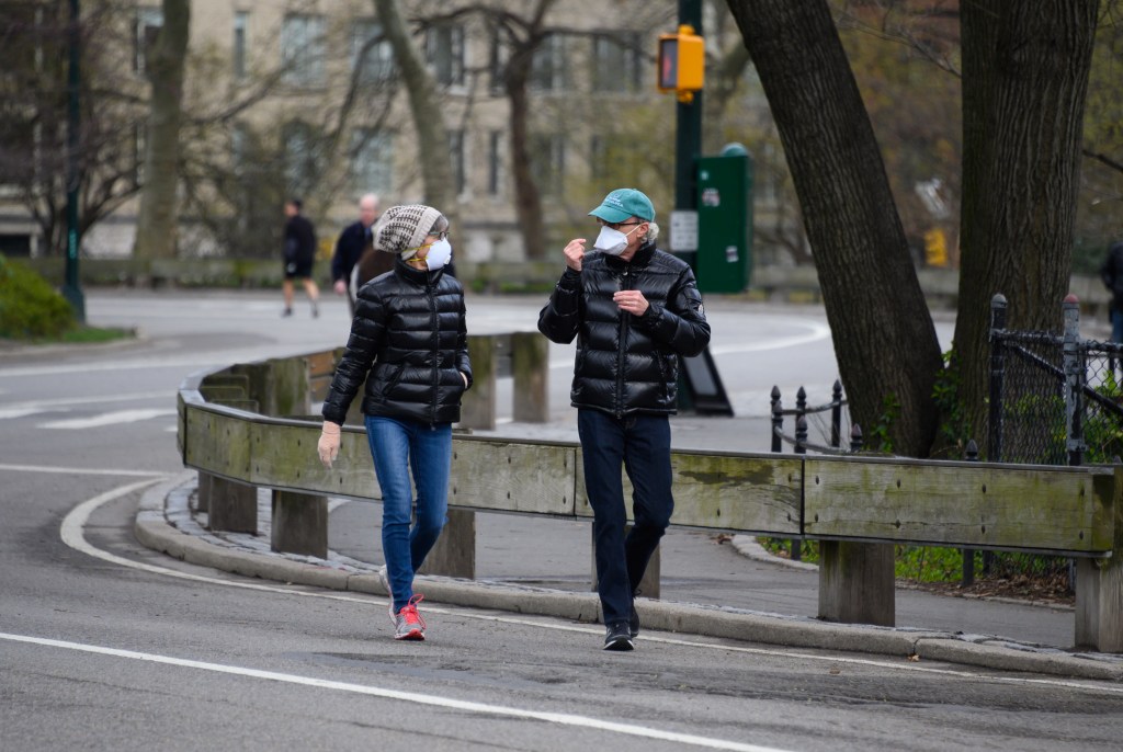 People walk in a New York City park during the coronavirus pandemic.