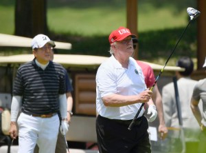 U.S. President Donald Trump plays golf at Mobara Country Club in Mobara, south of Tokyo, Sunday, May 26, 2019.
