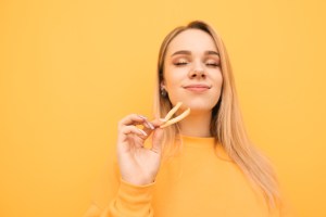 Woman Smelling Fries