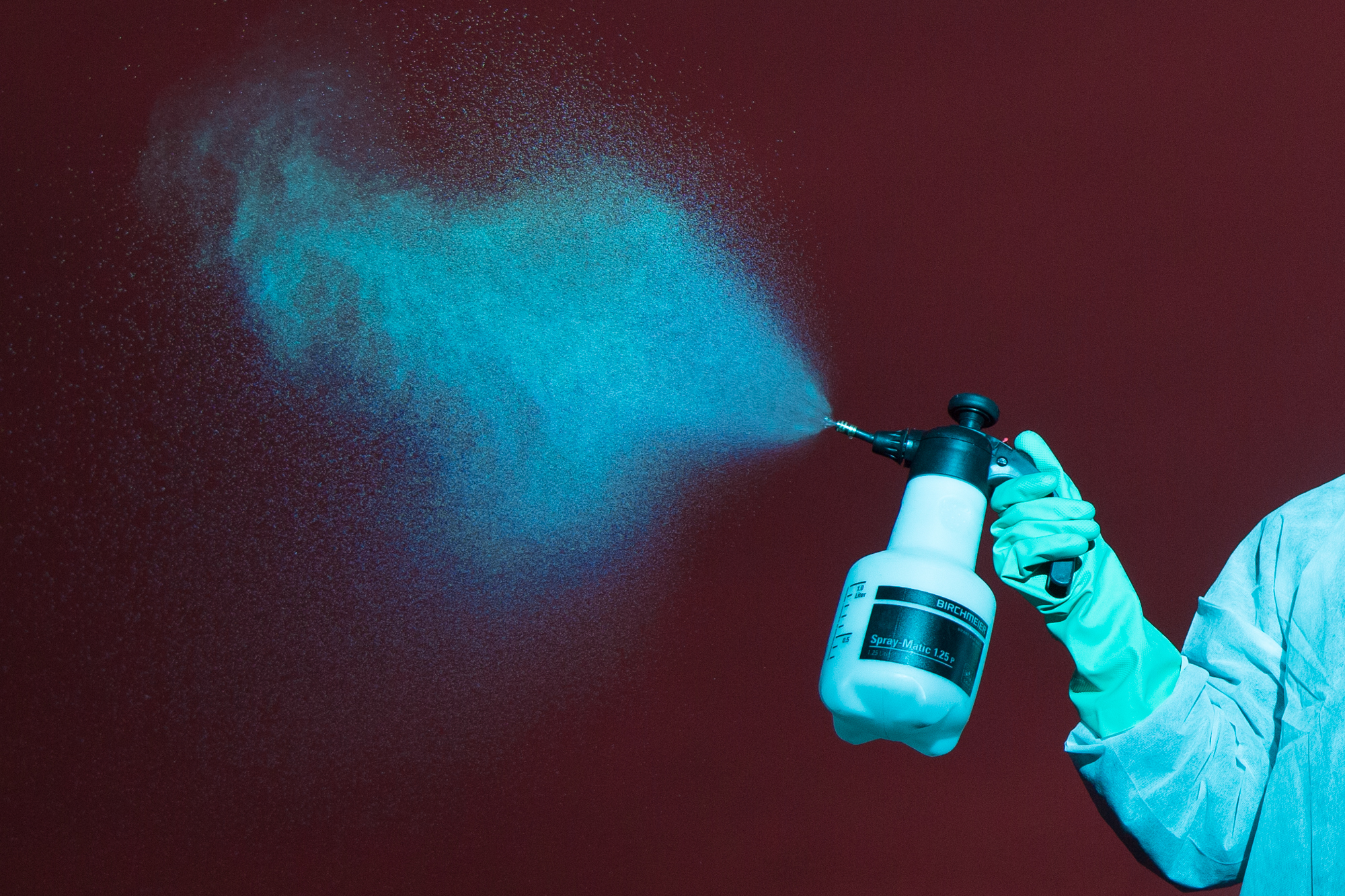 A spray bottle is used to spray liquid into the air