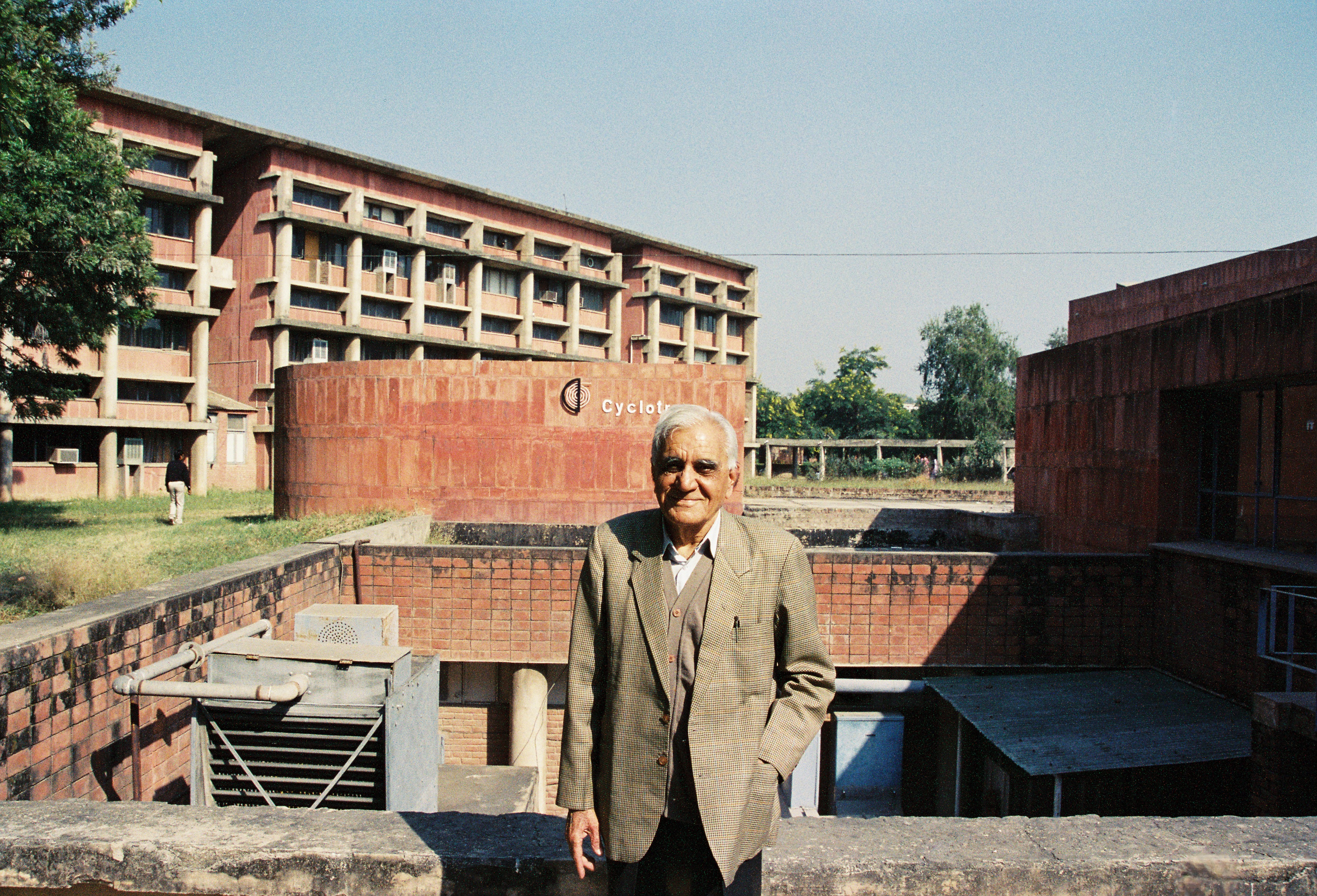 Late Dr Harman Singh Hans standing in front of the Cyclotron building at Panjab University (Photo credit: Jahnavi Phalkey).jpg