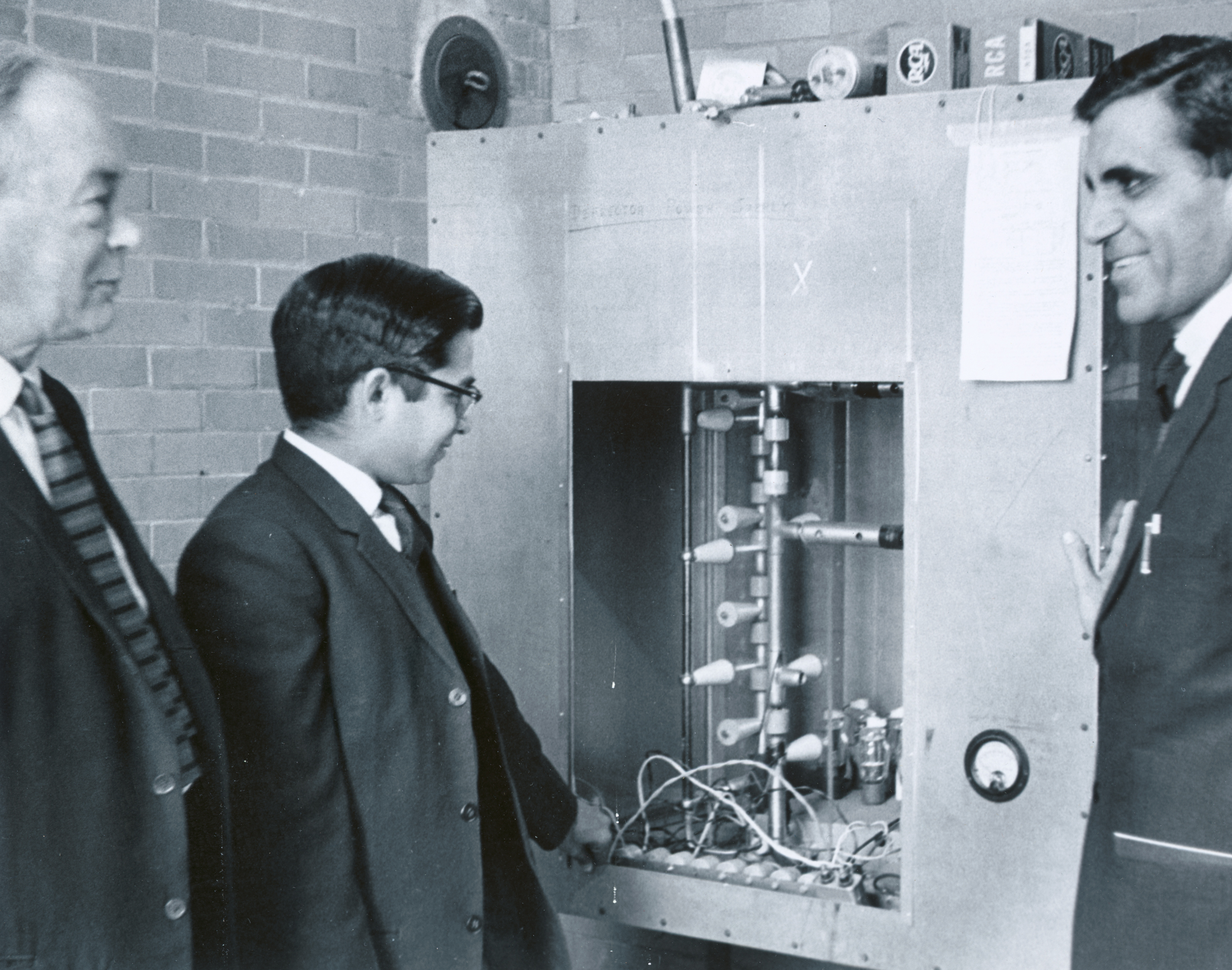 Dr Harry W Fulbright (left) donated the 1936-cyclotron to Dr HS Hans (right). Seen in the middle is Dr IM Govil who went to Rochester to get it packed, dismantled and shipped to India in 1966.jpg