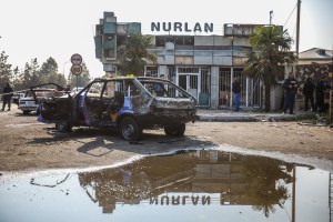 The wreckage of a car damaged during an Armenian rocket attack in Barda city on October 29, 2020 in Barda, Azerbaijan.