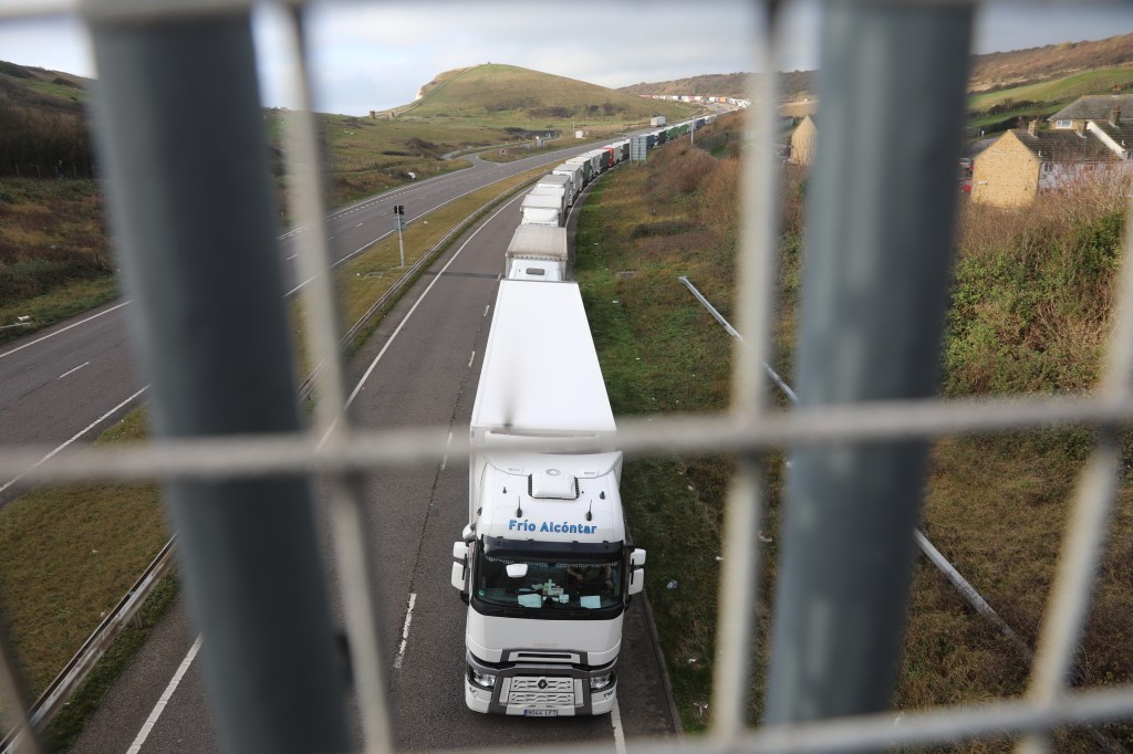 Queues of lorries stretch into the distance in Kent. All photos: Peter Yeung​