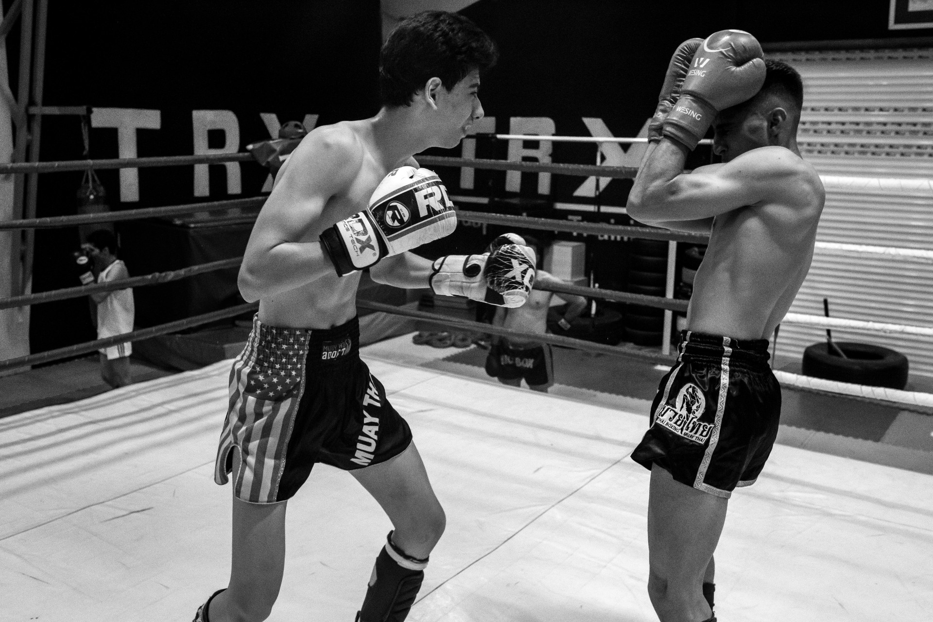 Two athletes fighting in the ring of a kickboxing club in Kerman, Iran. Photo: Hossein Kazemi / Middle East Images