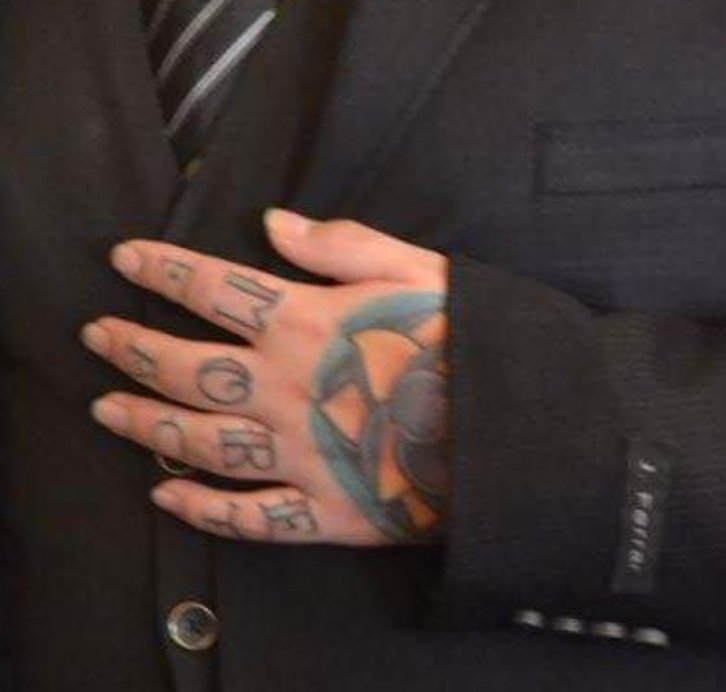 tattooed hand