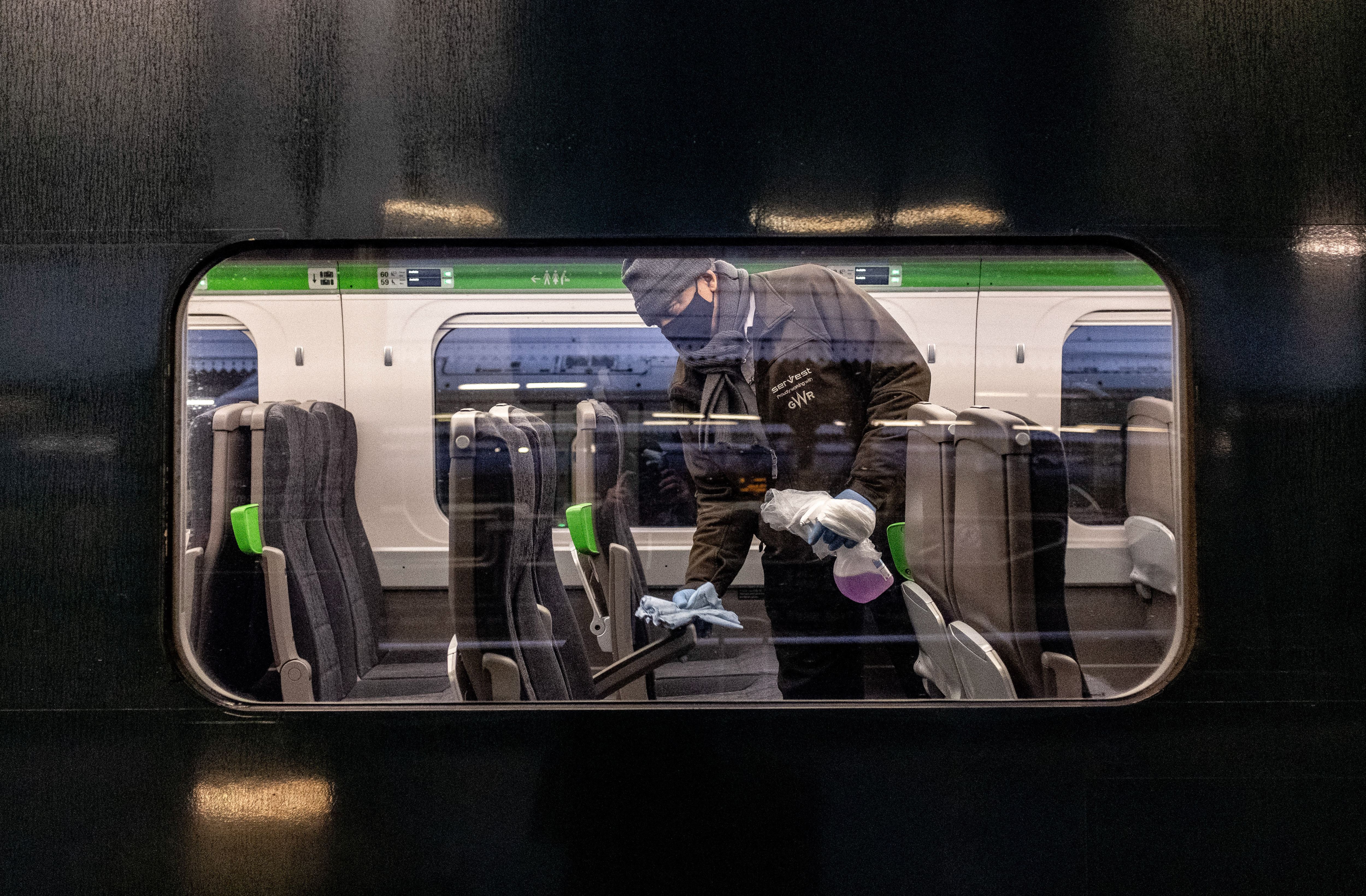 A cleaner on a train at Paddington Station in London, UK. Photo: May James/SOPA Images/LightRocket via Getty Images