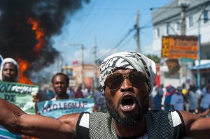 People stage a demonstration in Port-Au-Prince, Haiti on February 14, 2021​demanding that President Jovenel Moïse​ resign