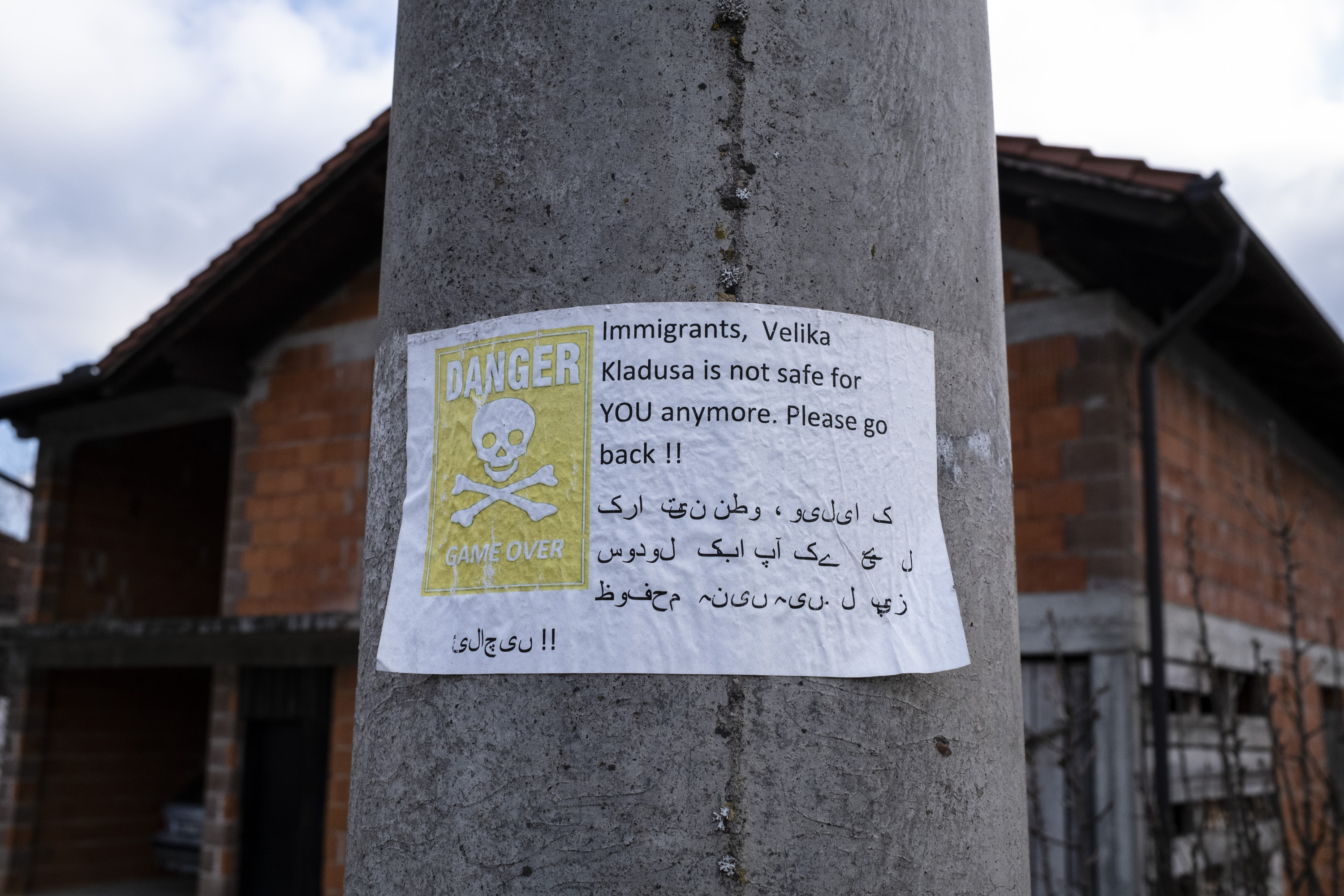 Bosnian locals in the town of Velika Kladusa have posted signs warning migrants to leave.