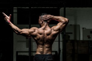 A rear view of a body builder.