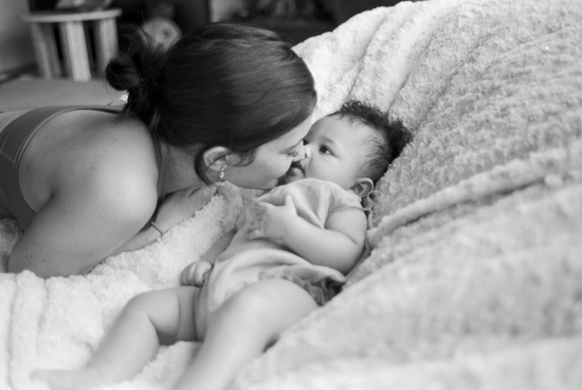 Kylie Jenner kissing her daughter Stormi Webster as a baby.