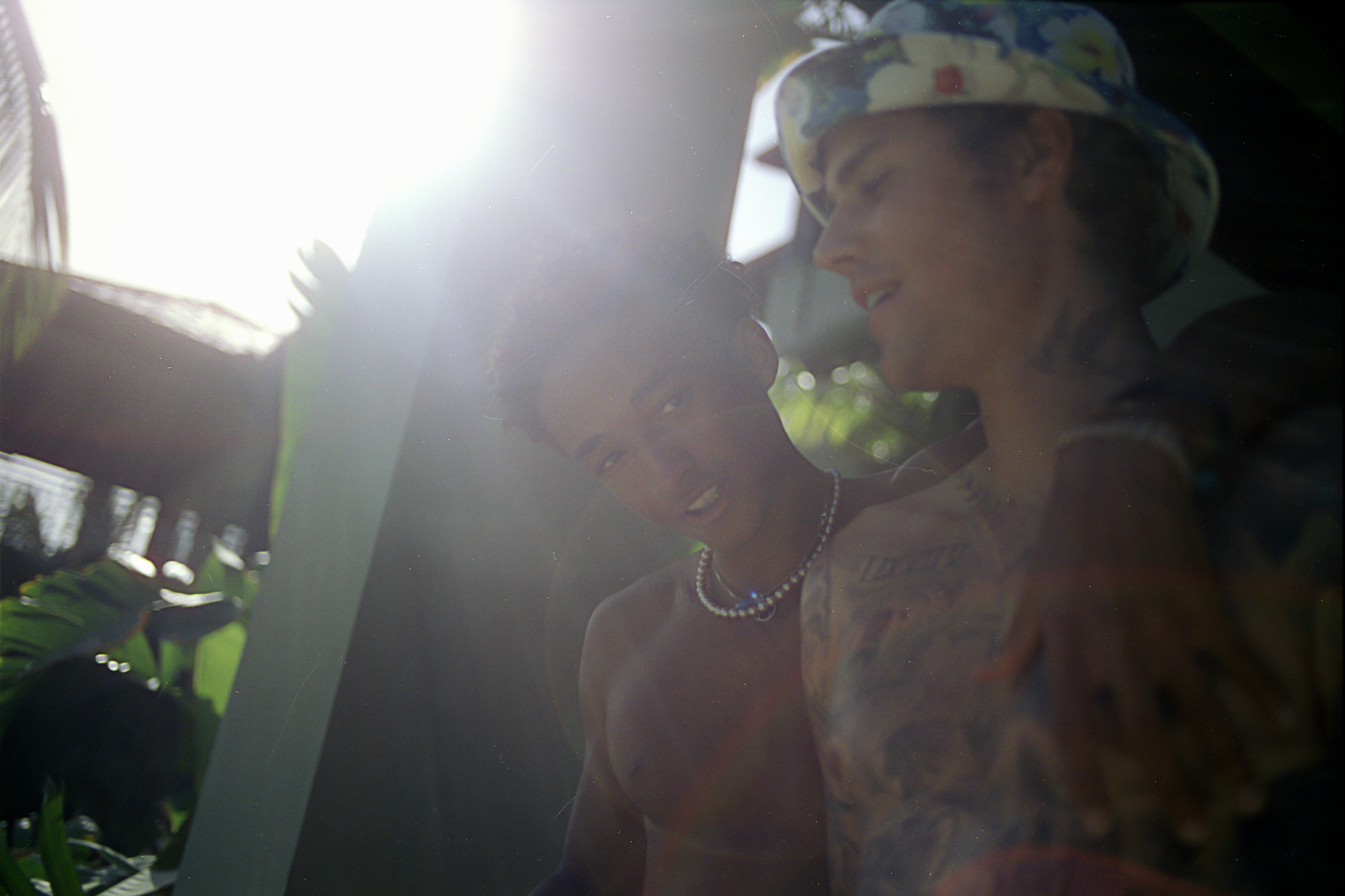 Jaden Smith with his arm around Justin Bieber.
