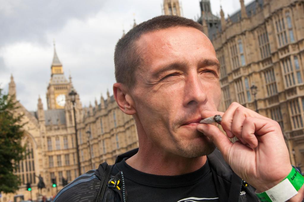 man smoking joint parliament london