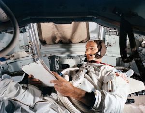 ​Collins in the command module simulator. Image: NASA