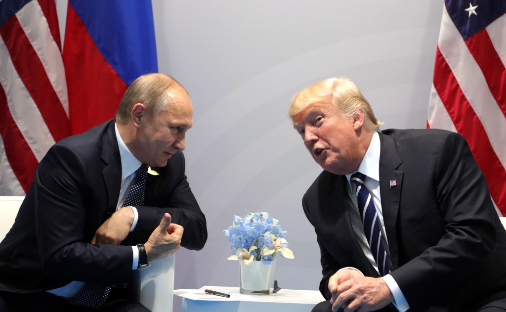 Vladimir Putin and President Donald Trump meeting at the 2017 G20 summit. (Photo by: Universal History Archive/Universal Images Group via Getty Images)
