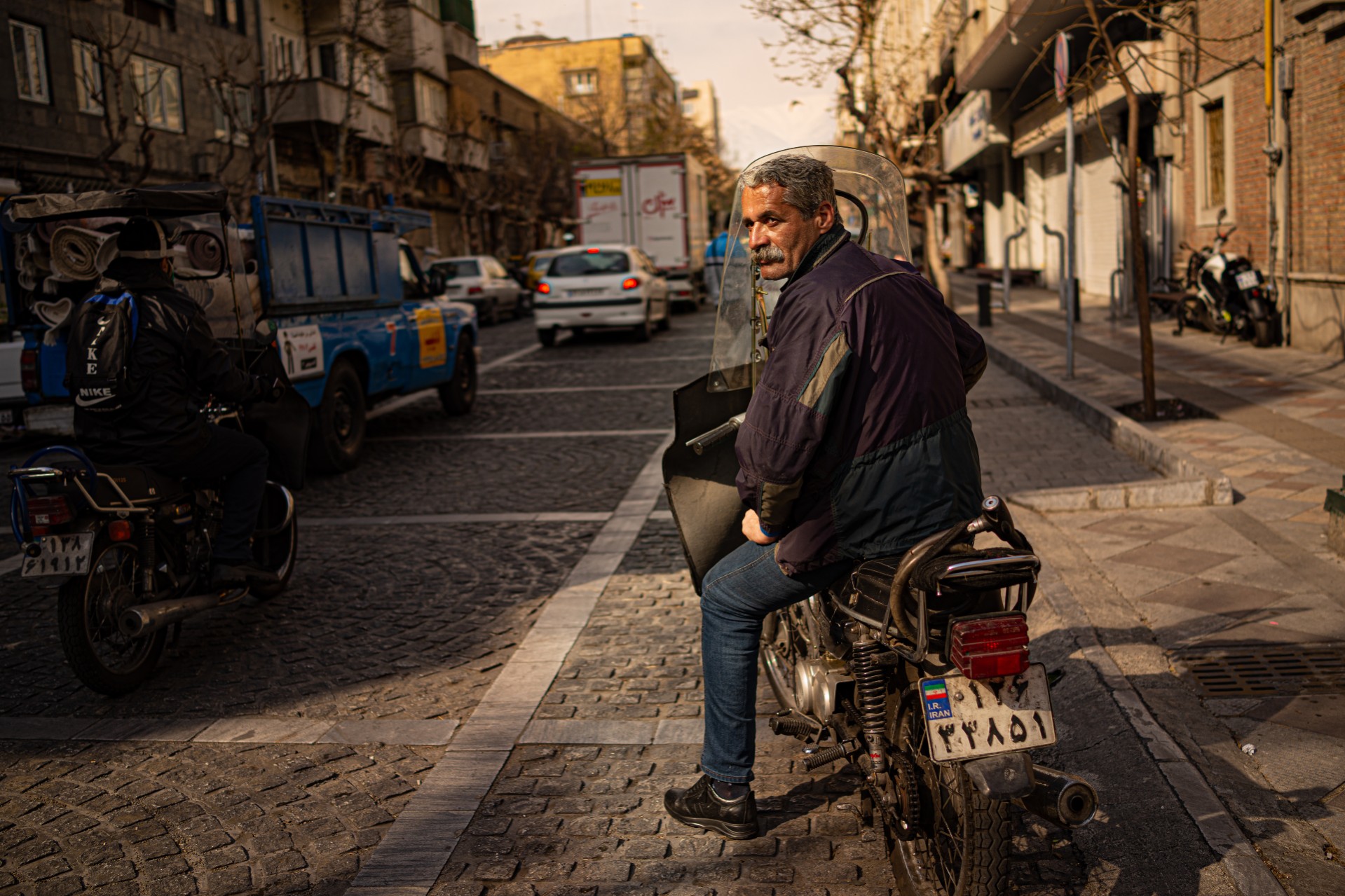 This is the Moto-Taxi driver from the opening scenes in Tehran. We were out shooting and needed to get across town quickly, getting a few shots from the back was just a bonus.