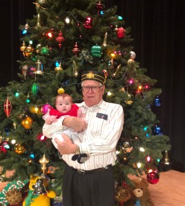 ​Michael Clarke poses in front of a tree during the 2020 Christmas season.