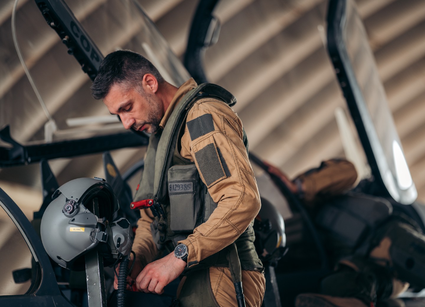Sgt. Barry, a fighter pilot prepares to fly on a mission out of the French airbase in Niamey, Niger.